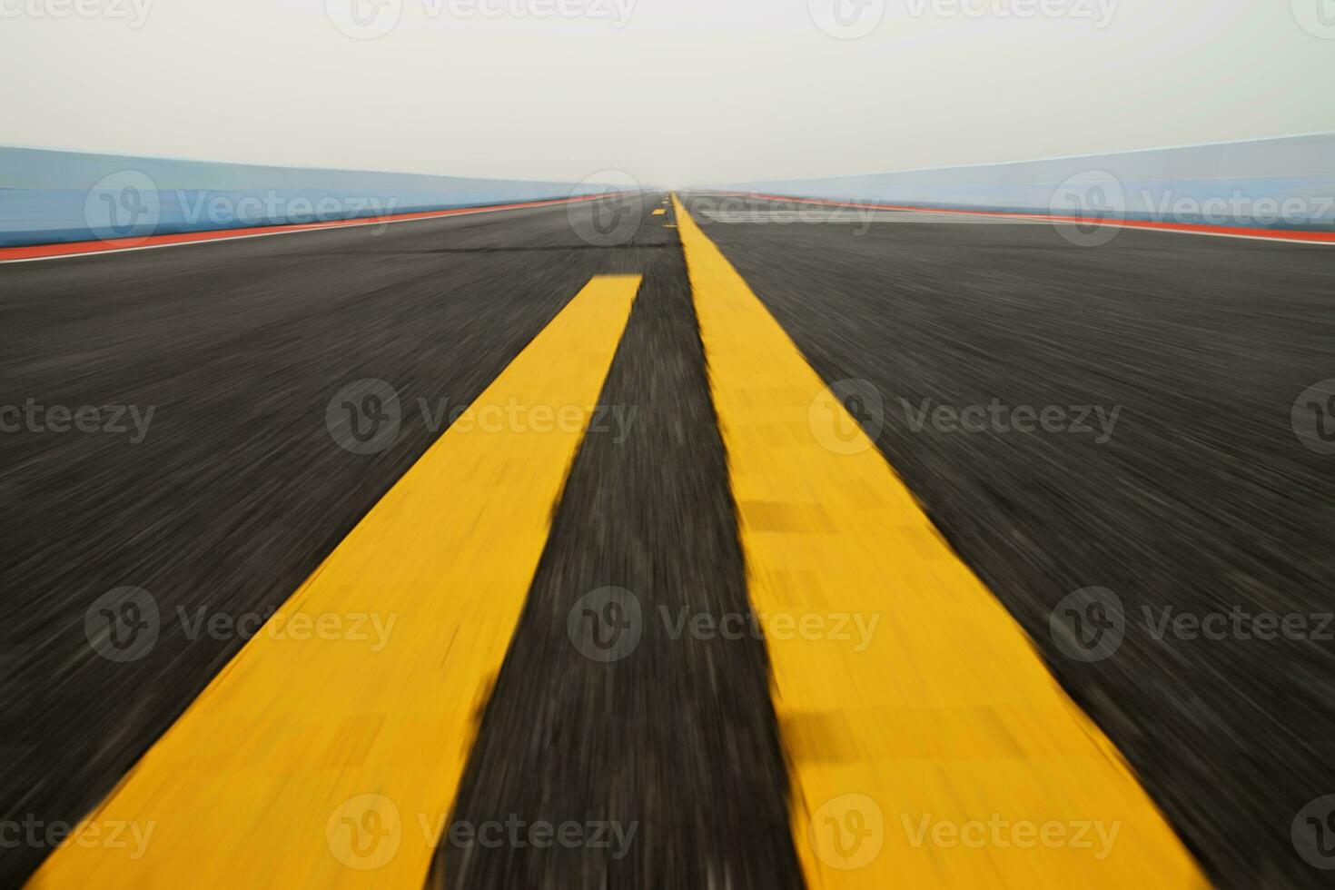 Motion on the road with yellow traffic lines. photo