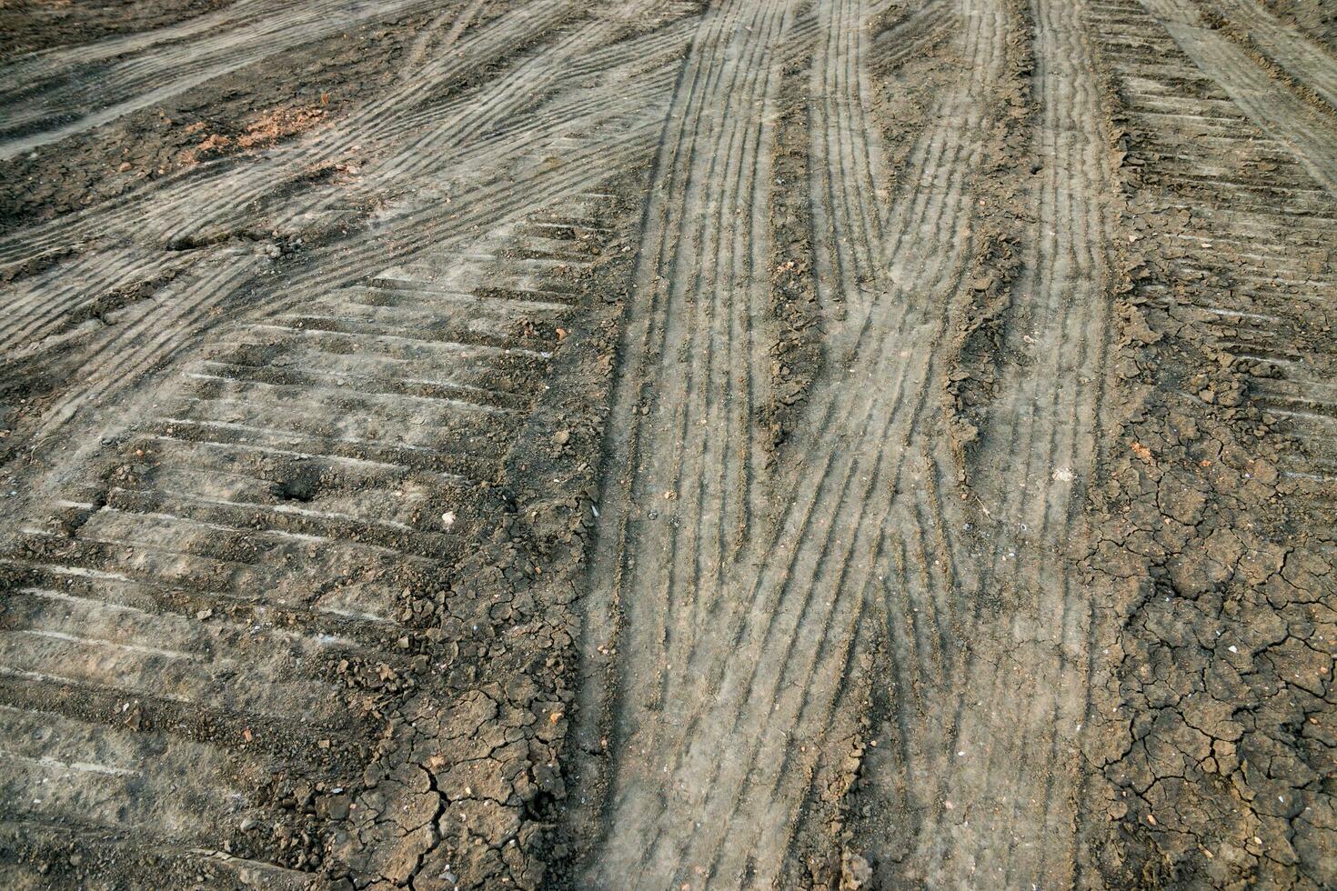 Wheel tracks on the soil. photo