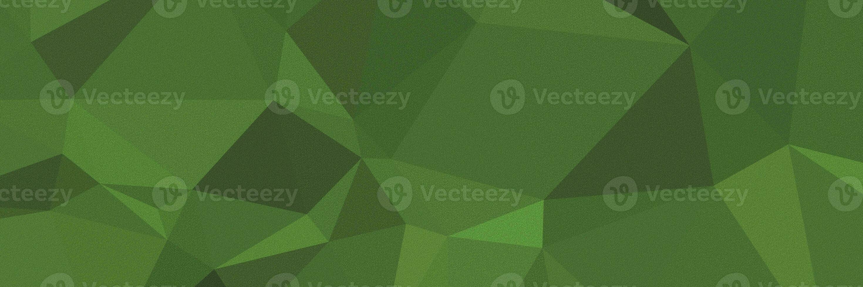 abstract green grainny background with triangles photo