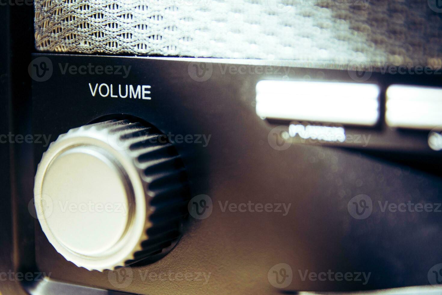 Volume wheel on an old and vintage analog radio. Close-up and detail. Copy Space. photo