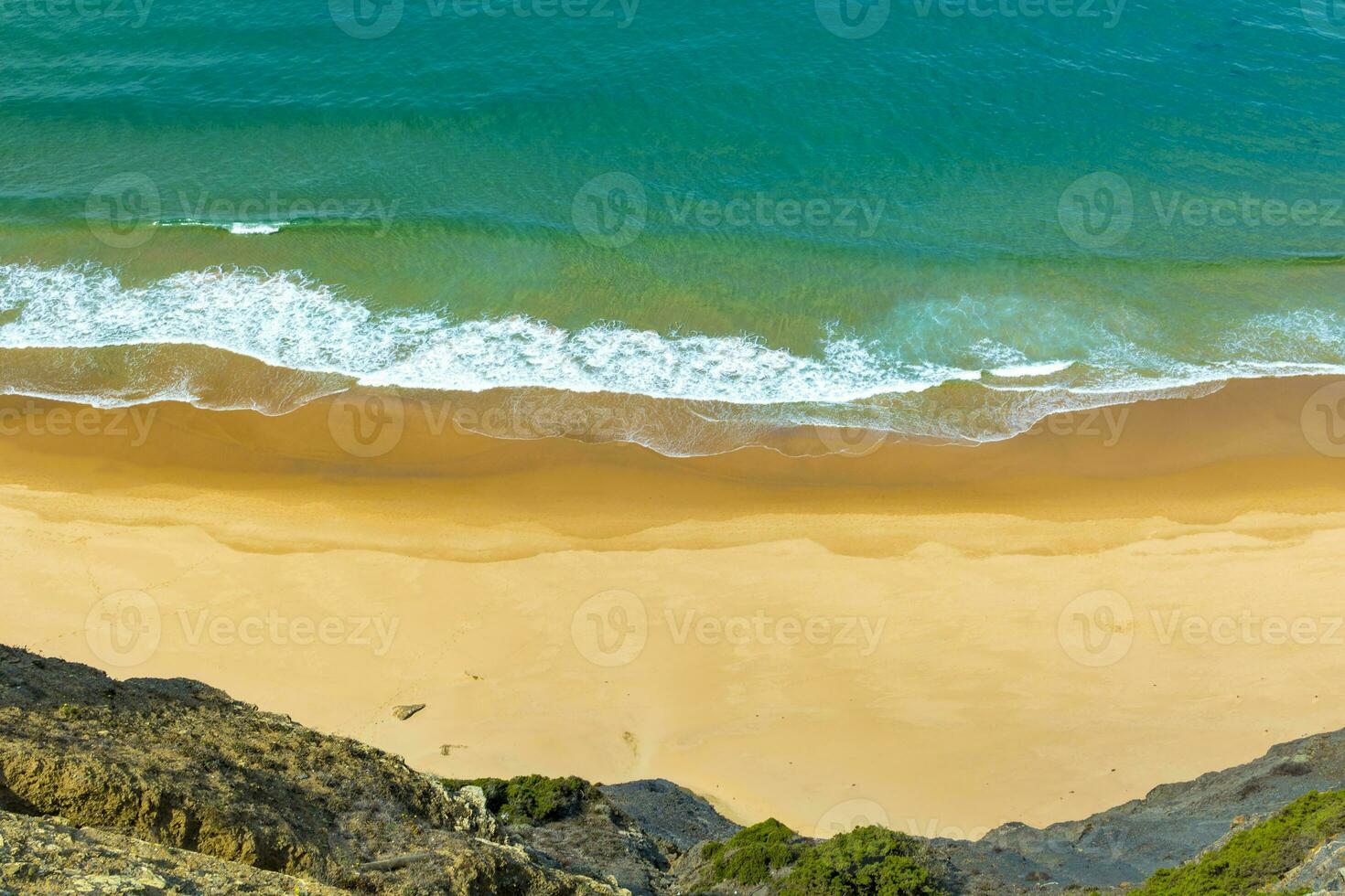 Empty remote beach in Algarve, Portugal. photo