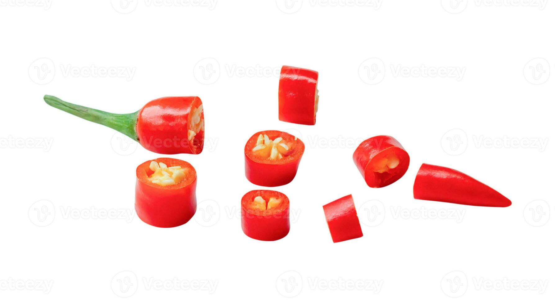 Fresh red chili pepper slices isolated on white background with clipping path. Top view and flat lay photo