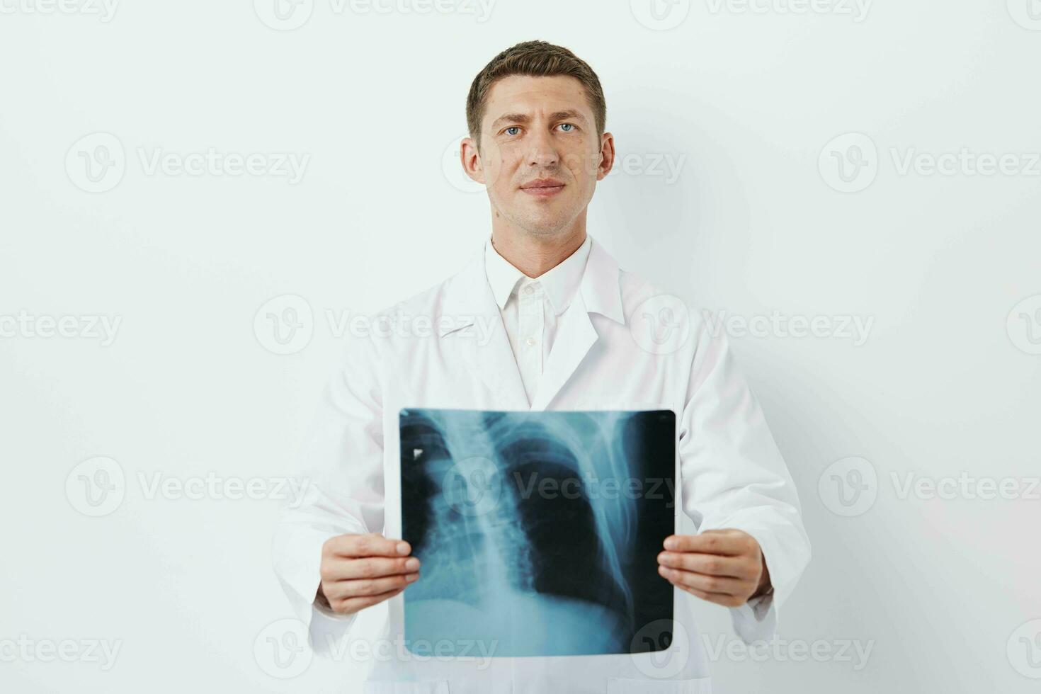 Man person health doctor clinical hospital x-ray adult physician stethoscope looking care specialist photo