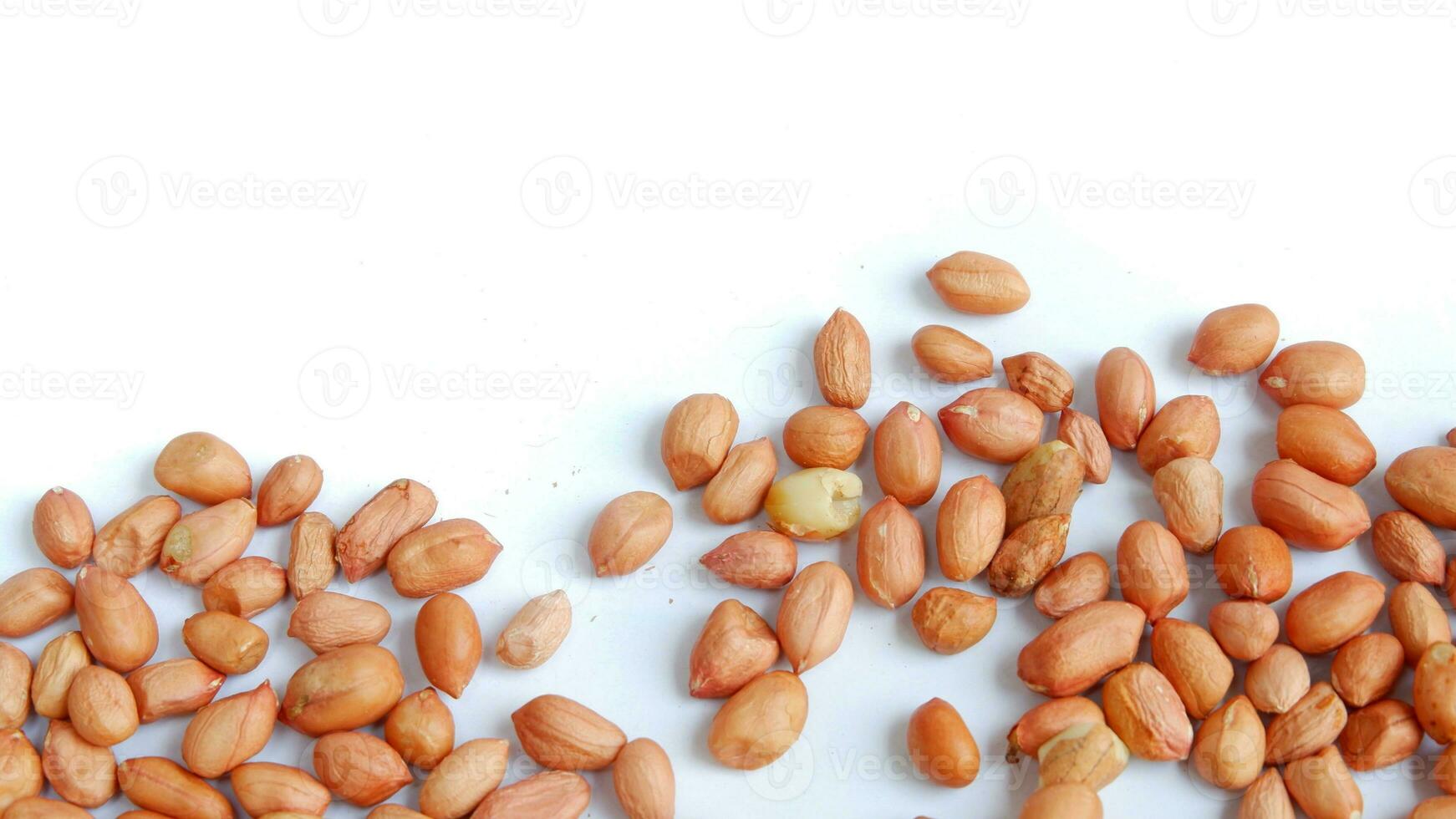 Organic Roasted Peanuts. Isolated Nut Snack Concept. Healthy, Delicious, and Crunchy Seeds photo