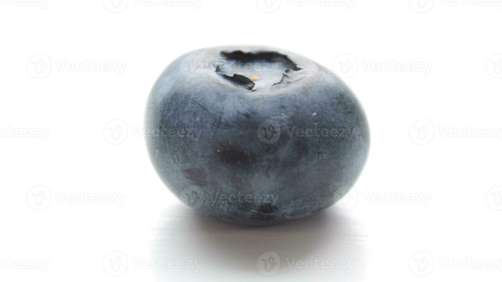 Fresh Blueberries. Organic, Juicy and Nutritious Fruit Isolated on White Background. Healthy Snacks Concept and Antioxidant-Rich Nutrition photo