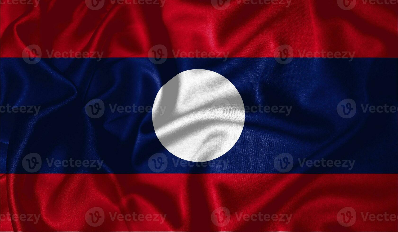 Laos flag waving fluttering in the wind with realistic texture fabric silk satin background photo
