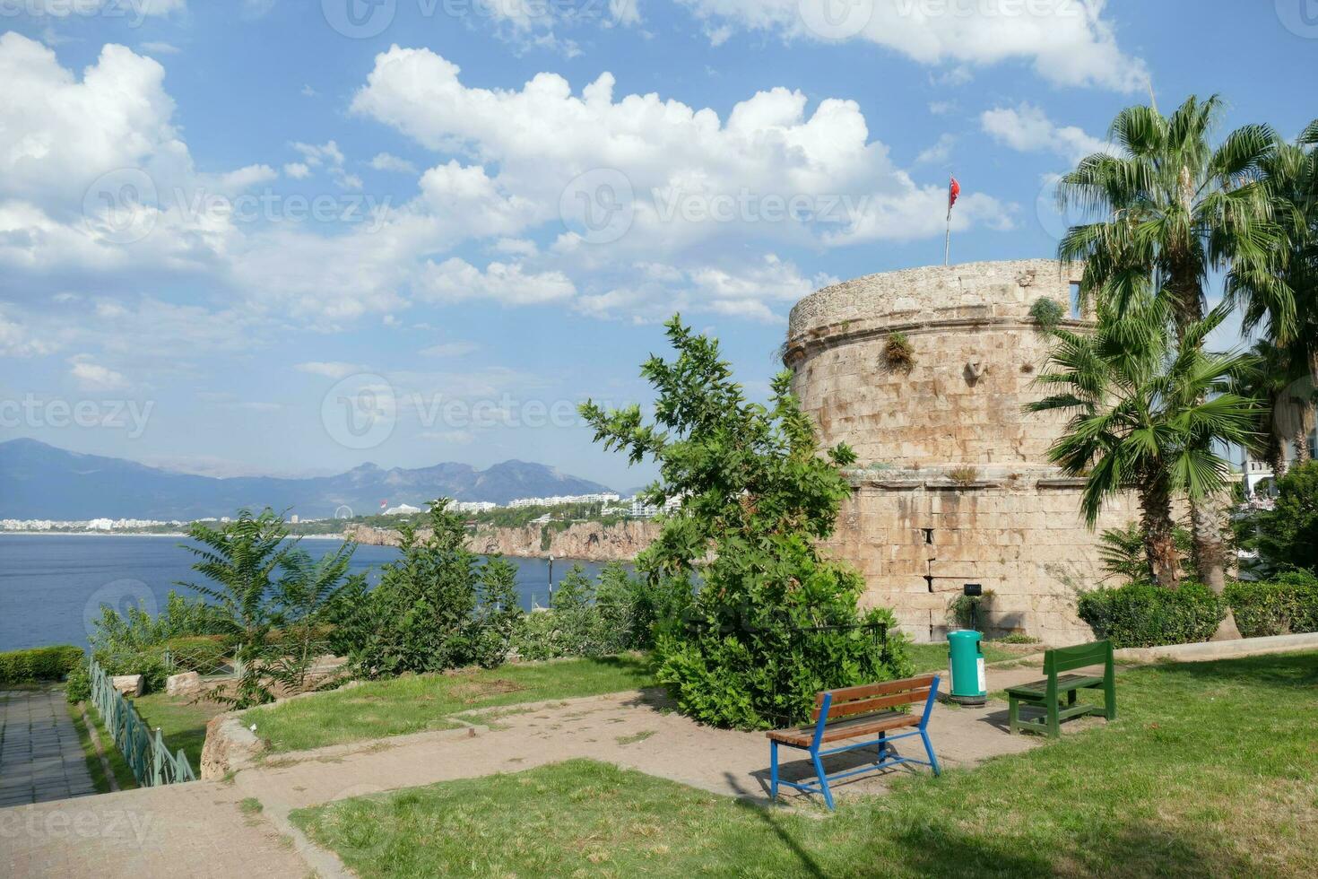 Ancient defensive tower on cliff photo