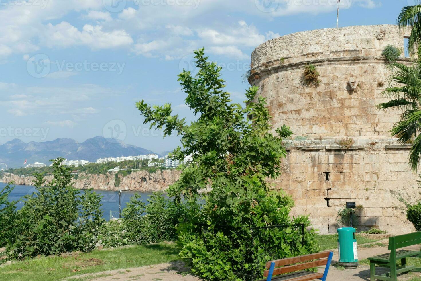 Ancient defensive tower on cliff photo