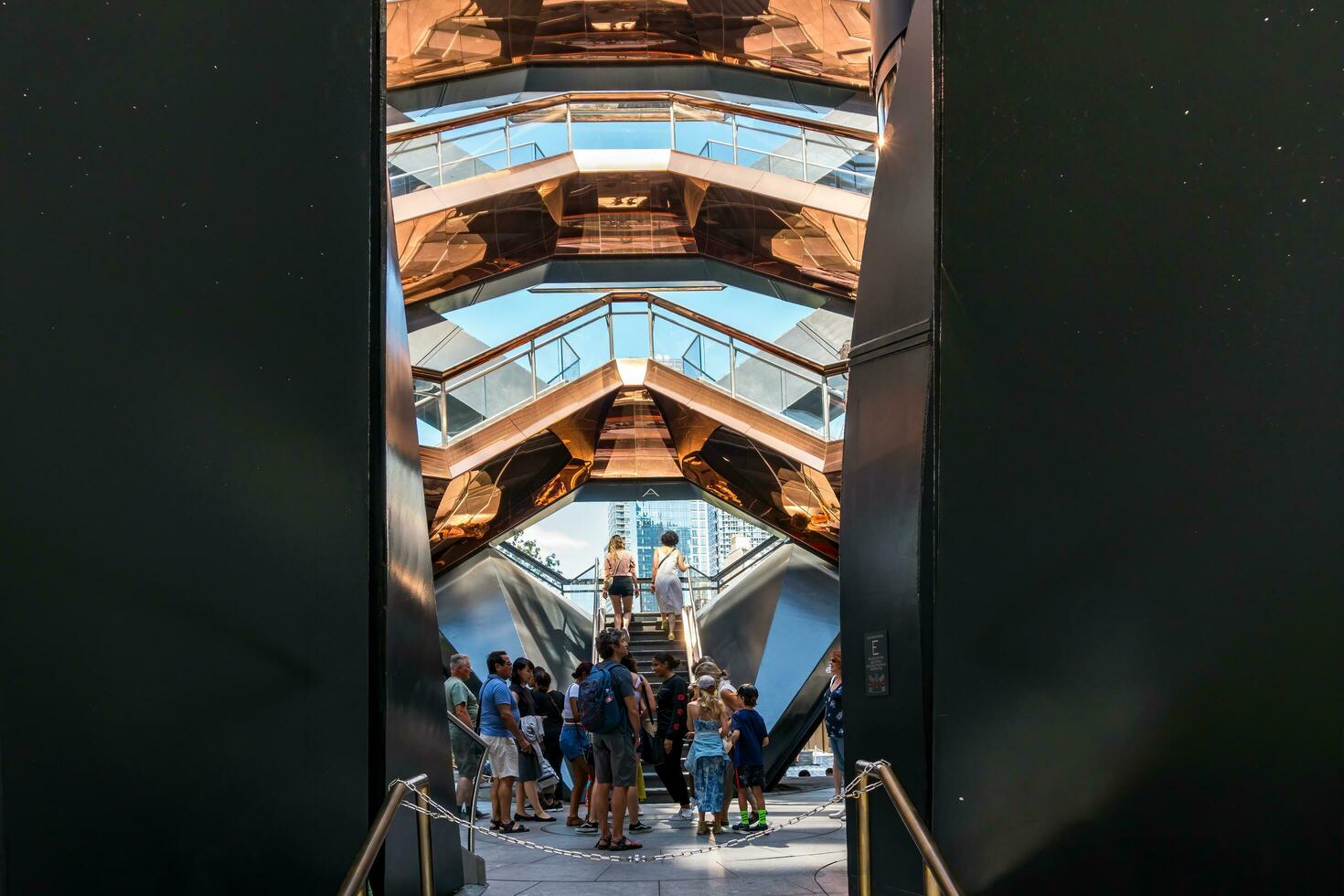 New York City, USA - August 9, 2019-View of the architectural structure called The Vessel in Manhattan during a sunny day photo