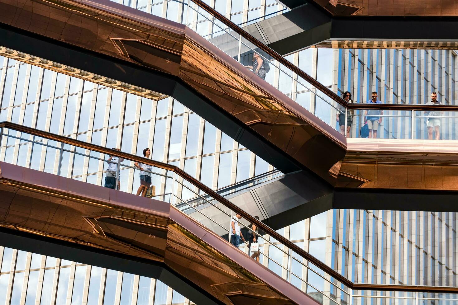 New York City, USA - August 9, 2019-View of the architectural structure called The Vessel in Manhattan during a sunny day photo