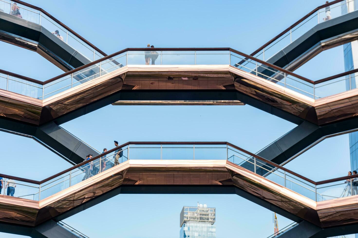 New York City, USA - August 9, 2019-View of the architectural structure called The Vessel in Manhattan during a sunny day photo