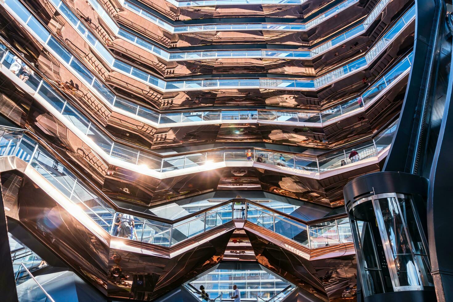 New York City, USA - August 9, 2019-View of the architectural structure called The Vessel in Manhattan during a sunny day photo