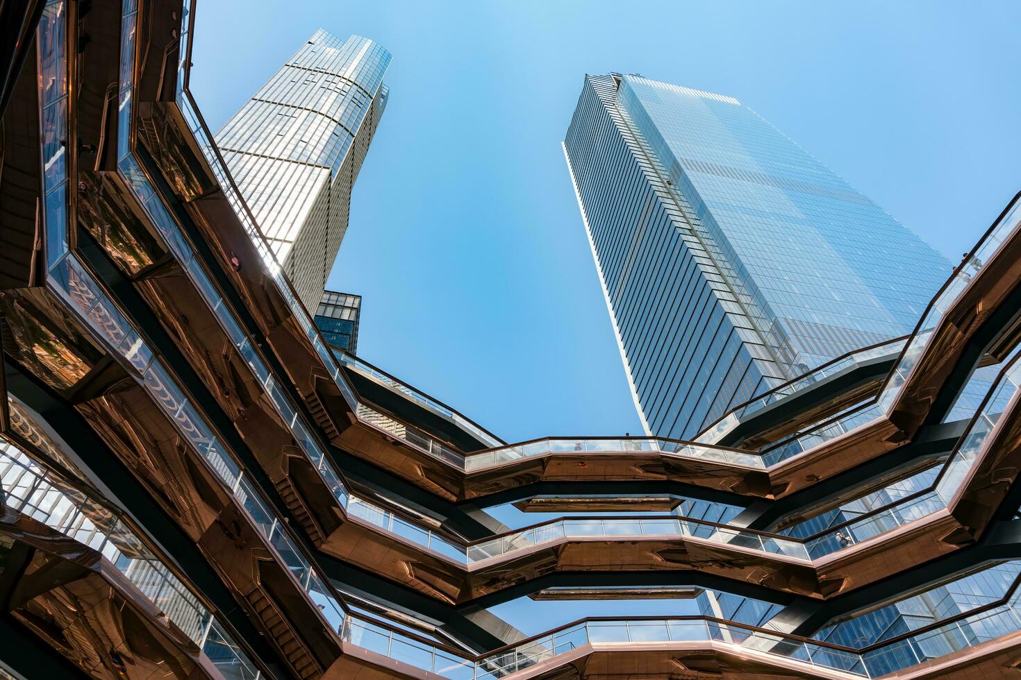 New York City, USA - August 9, 2019-View of the architectural structure called The Vessel in Manhattan during a sunny day photo