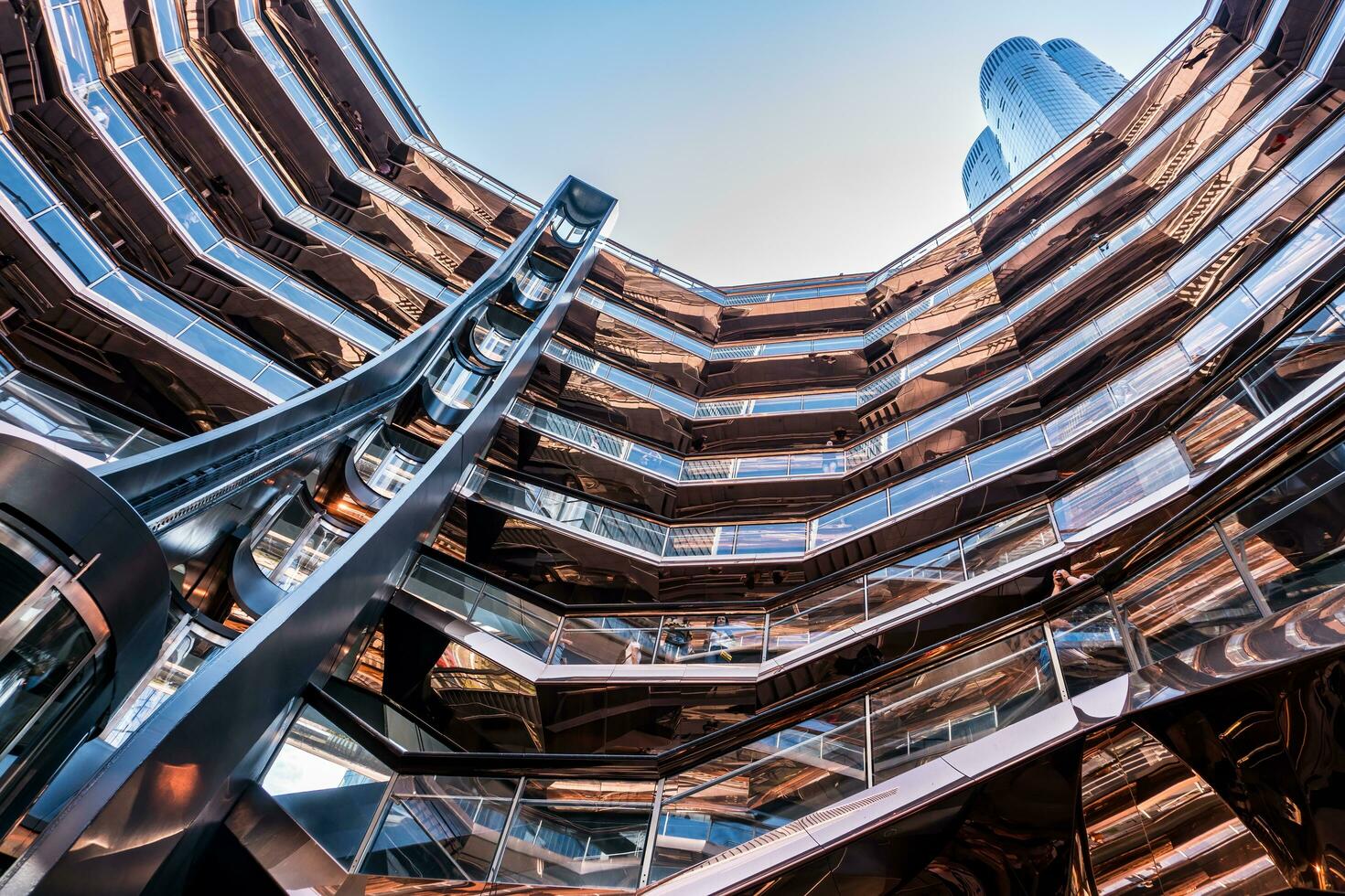 New York City, USA - August 9, 2019-View of the architectural structure called The Vessel in Manhattan during a sunny day photo
