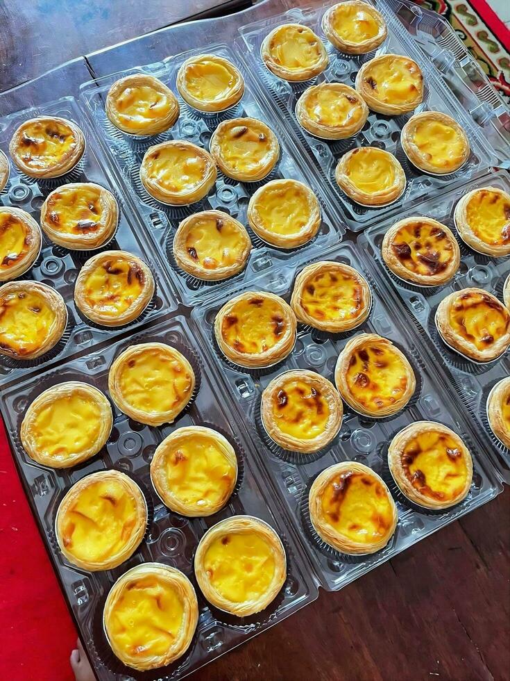 a tray of mini cheesecakes on a table photo