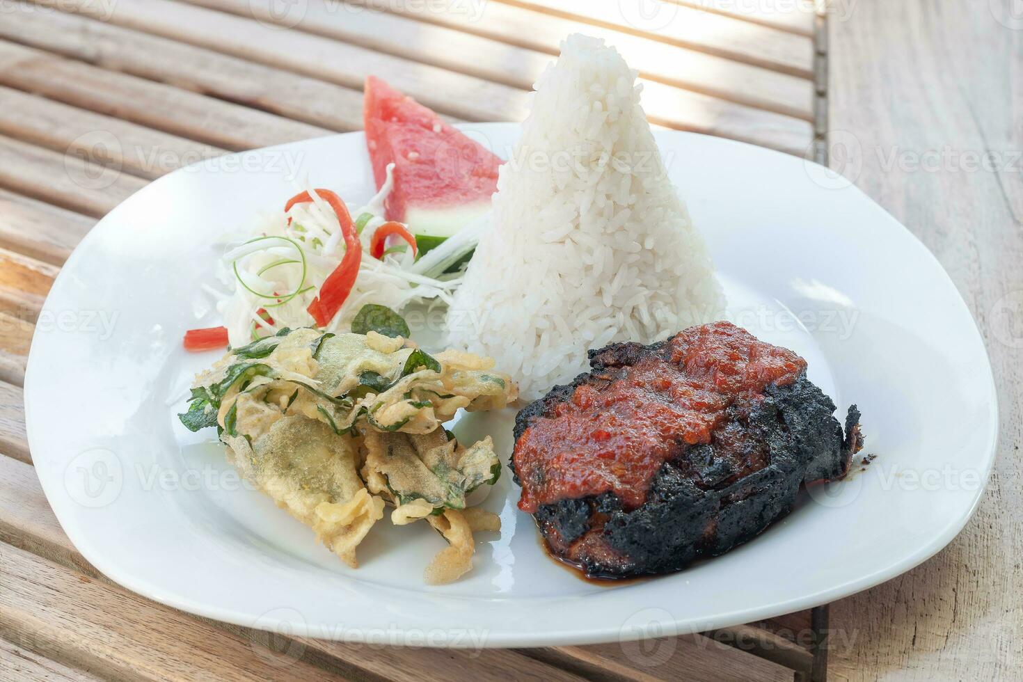 Nasi Ikan Bakar Sambal or Spicy Grilled Fish Rice photo