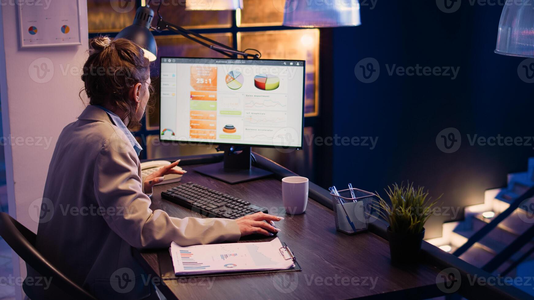 Furious stressed employee working on business project overtime, trying to finish financial report with analytics before deadline. Entrepreneur feeling frustrated under pressure. Handheld shot. photo