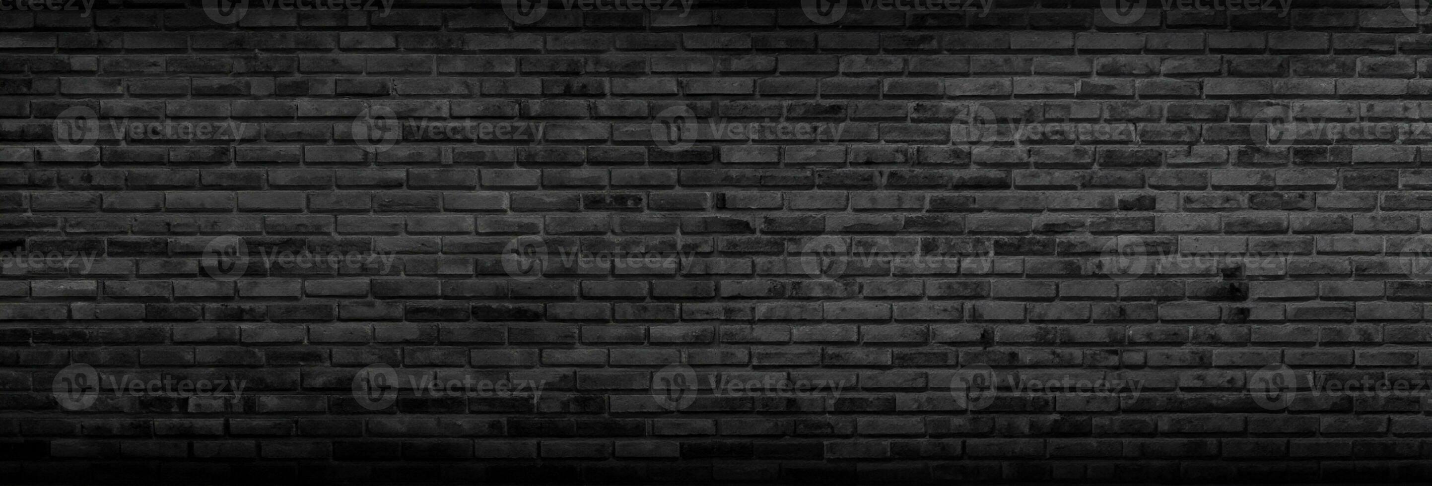 Panorama Black brick walls that are not plastered background and texture. The texture of the brick is black. Background of empty brick basement wall. photo