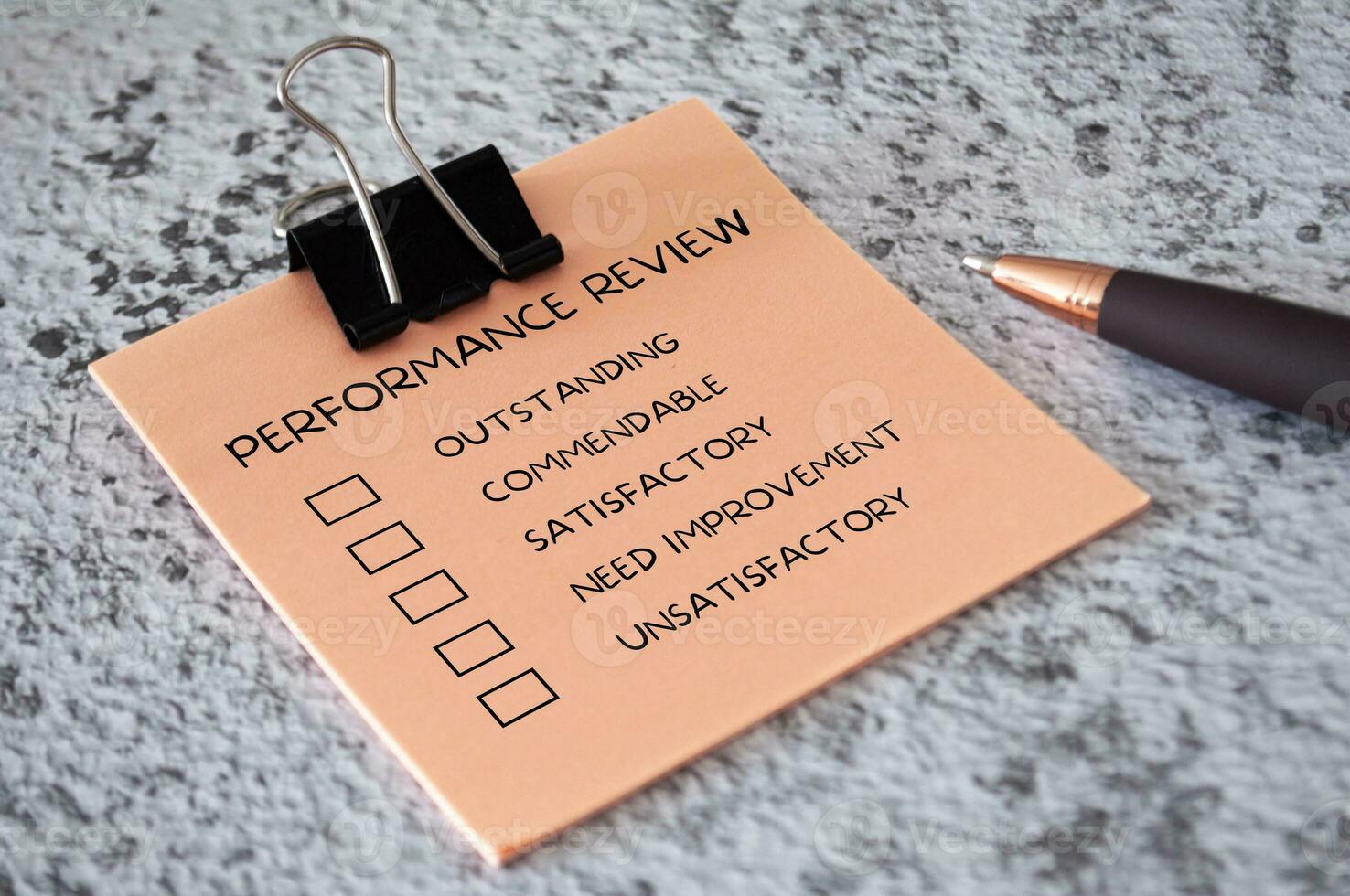 Performance Review checklist on sticky notes. Performance review concept. photo