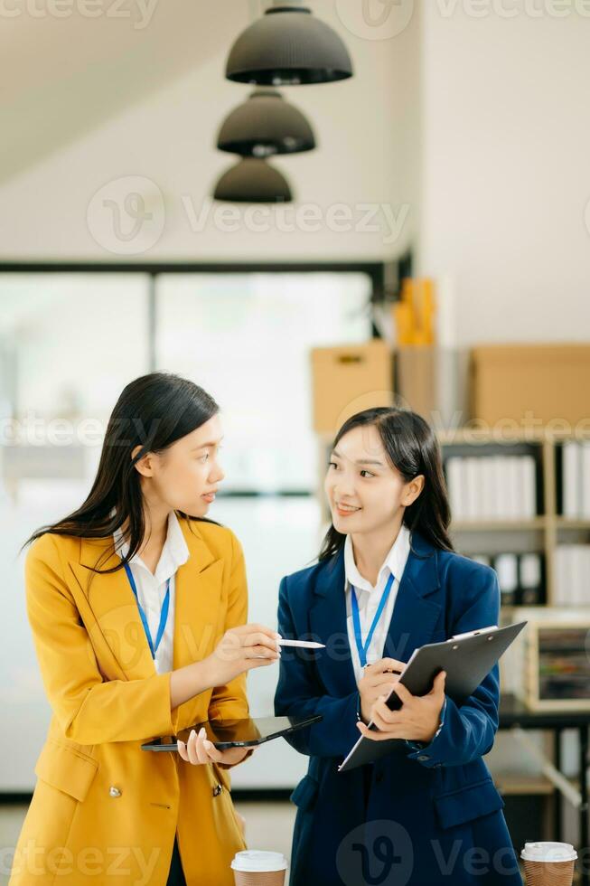 Portrait of success business people working together in modern office. Couple teamwork startup concept photo