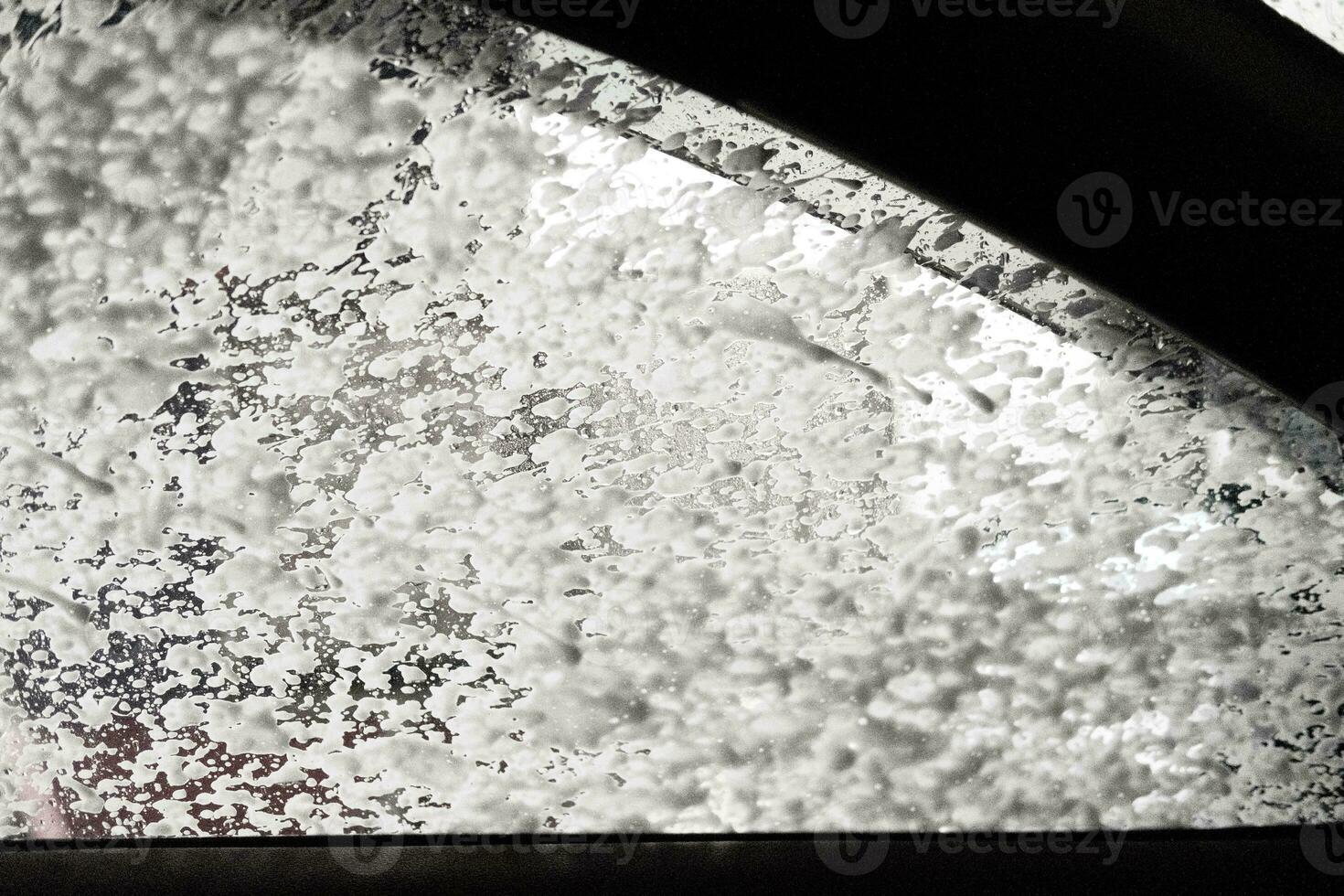Foam cover window in car wash photo
