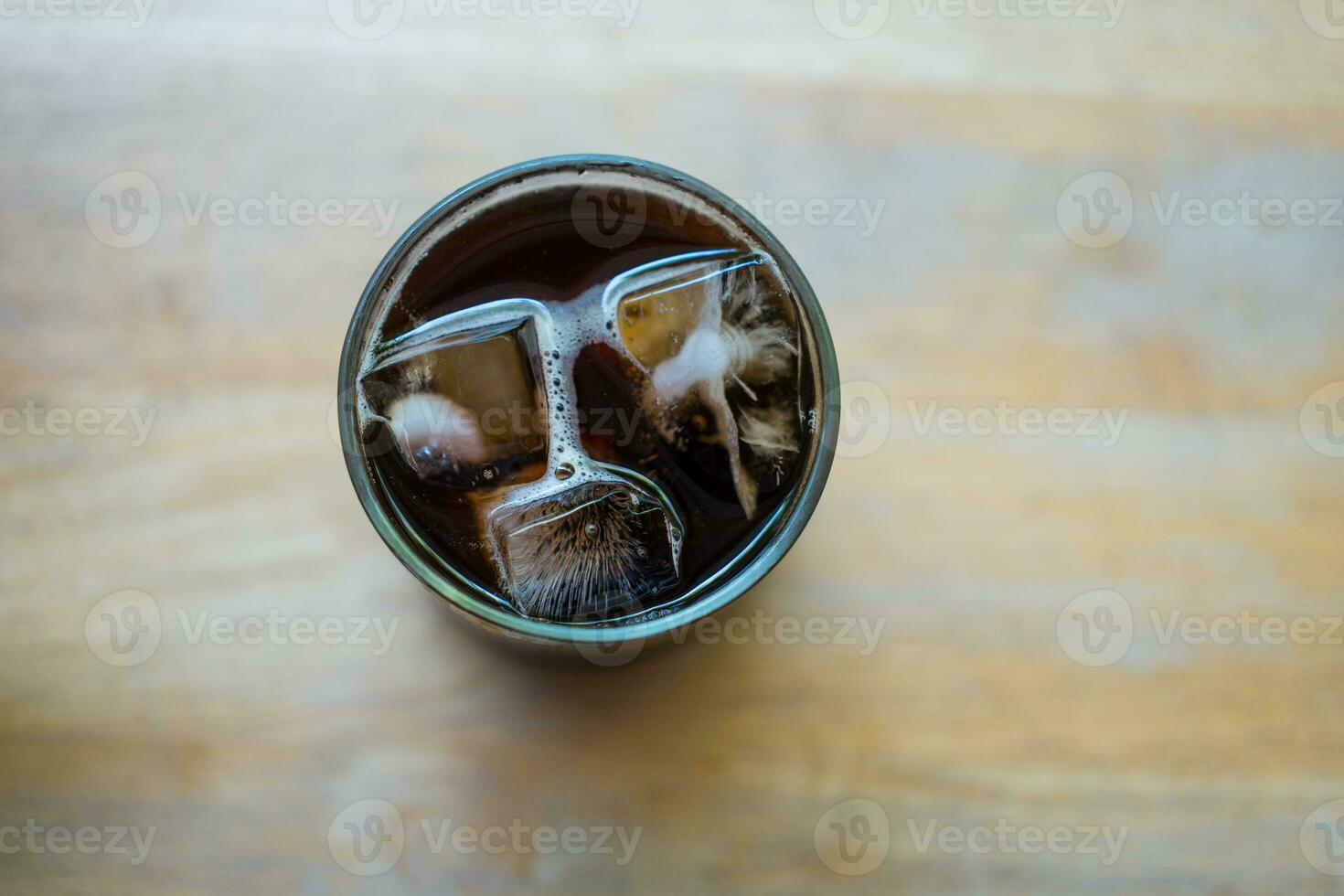 Overhead view of iced black coffee photo