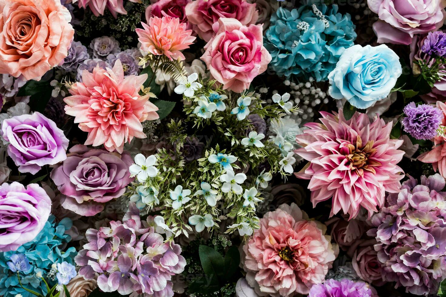 Flower background material produced with artificial flowers. photo