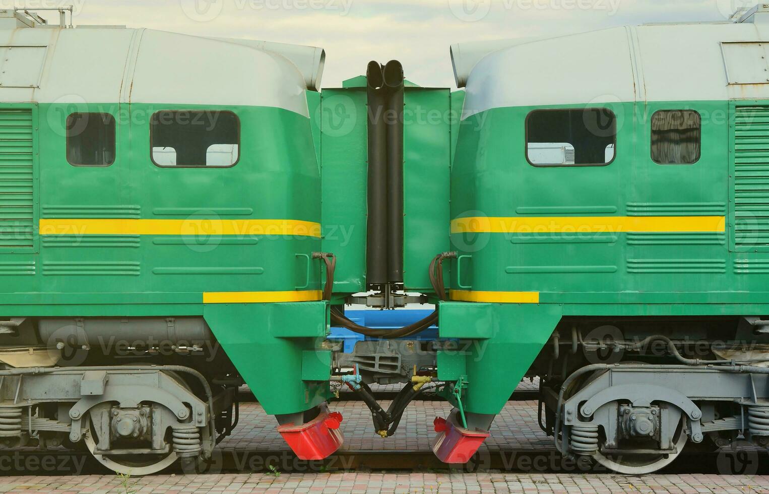 Transition between two electric trains. A small corridor in the role of a portal between the two sides of the cabin of a Russian electric train photo