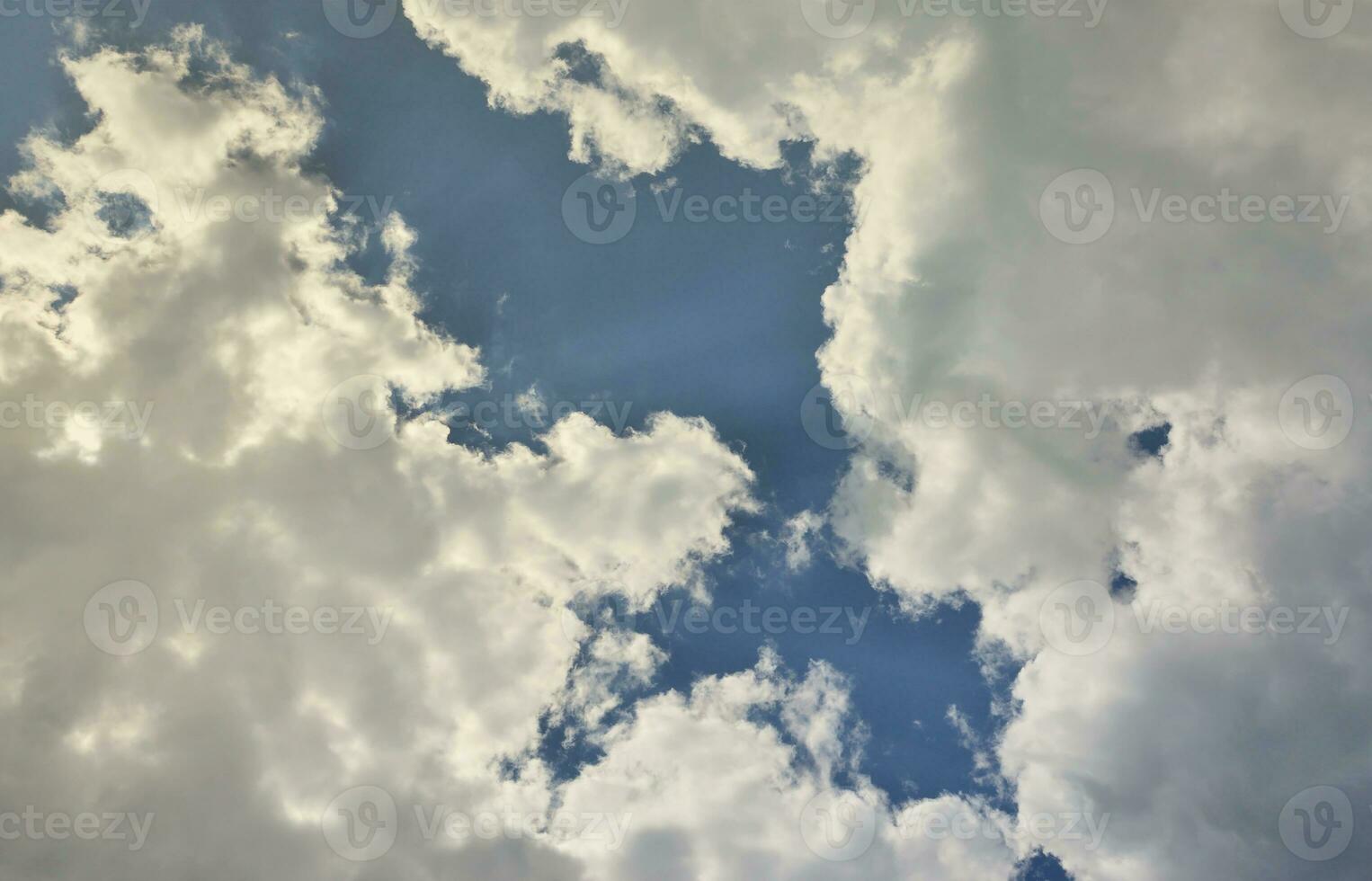 Beautiful blue sky background template with some space for input text message below isolated on blue photo