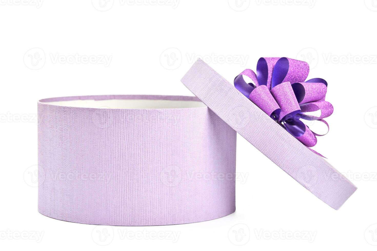 Round gift box with bow, isolated photo