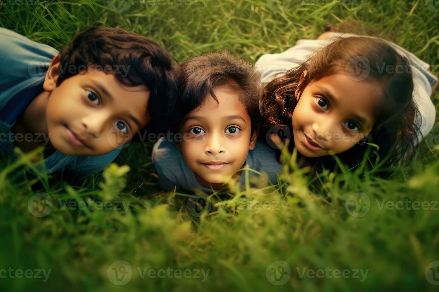 ai generado Tres niños disfrutando el césped foto