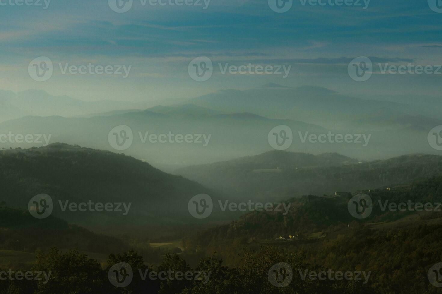 autumn landscapes of the Piedmontese Langhe with the bright colors of autumn in November photo