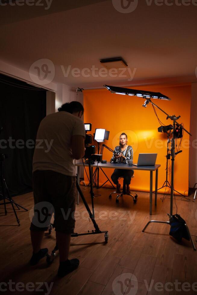 Videographer recording vlog for influencer. Content creator new media star on social media recording for internet web online subscribers audience new podcast episode photo