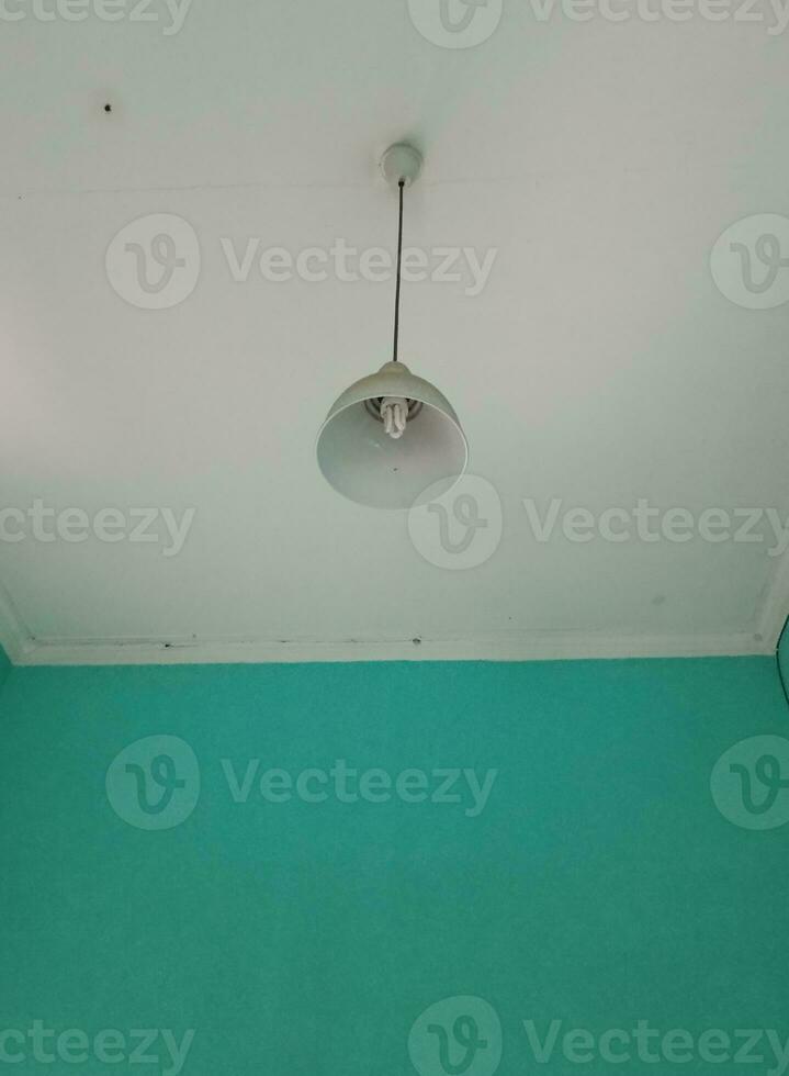 a lamp hanging on the ceiling photo