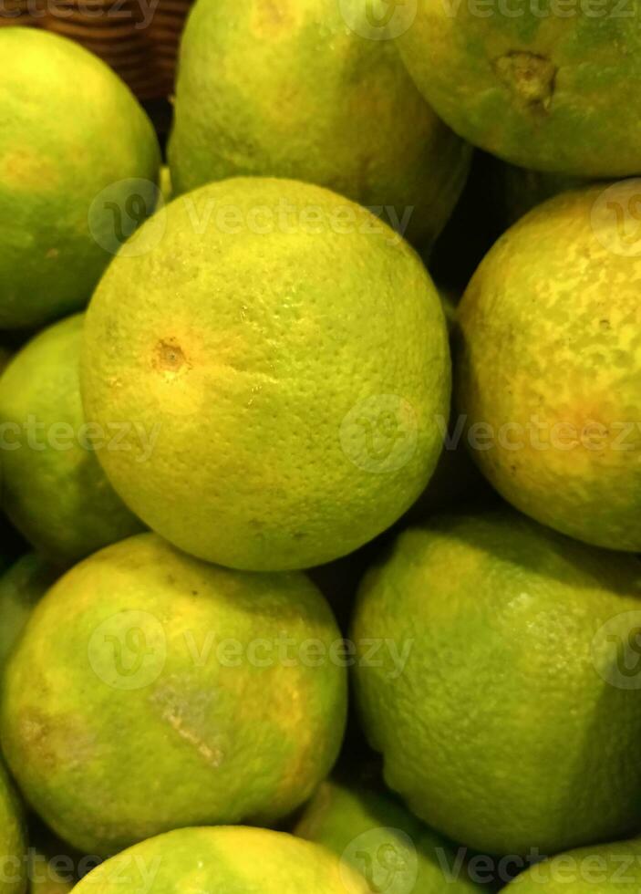 exótico naranja fruta, limón, o Lima. Fresco y sano Fruta foto