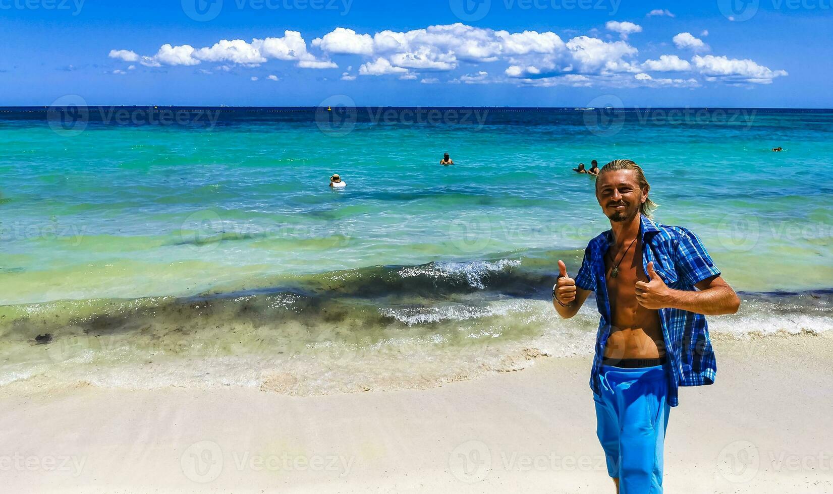 Male tourist Travelling man posing model Playa del Carmen Mexico. photo