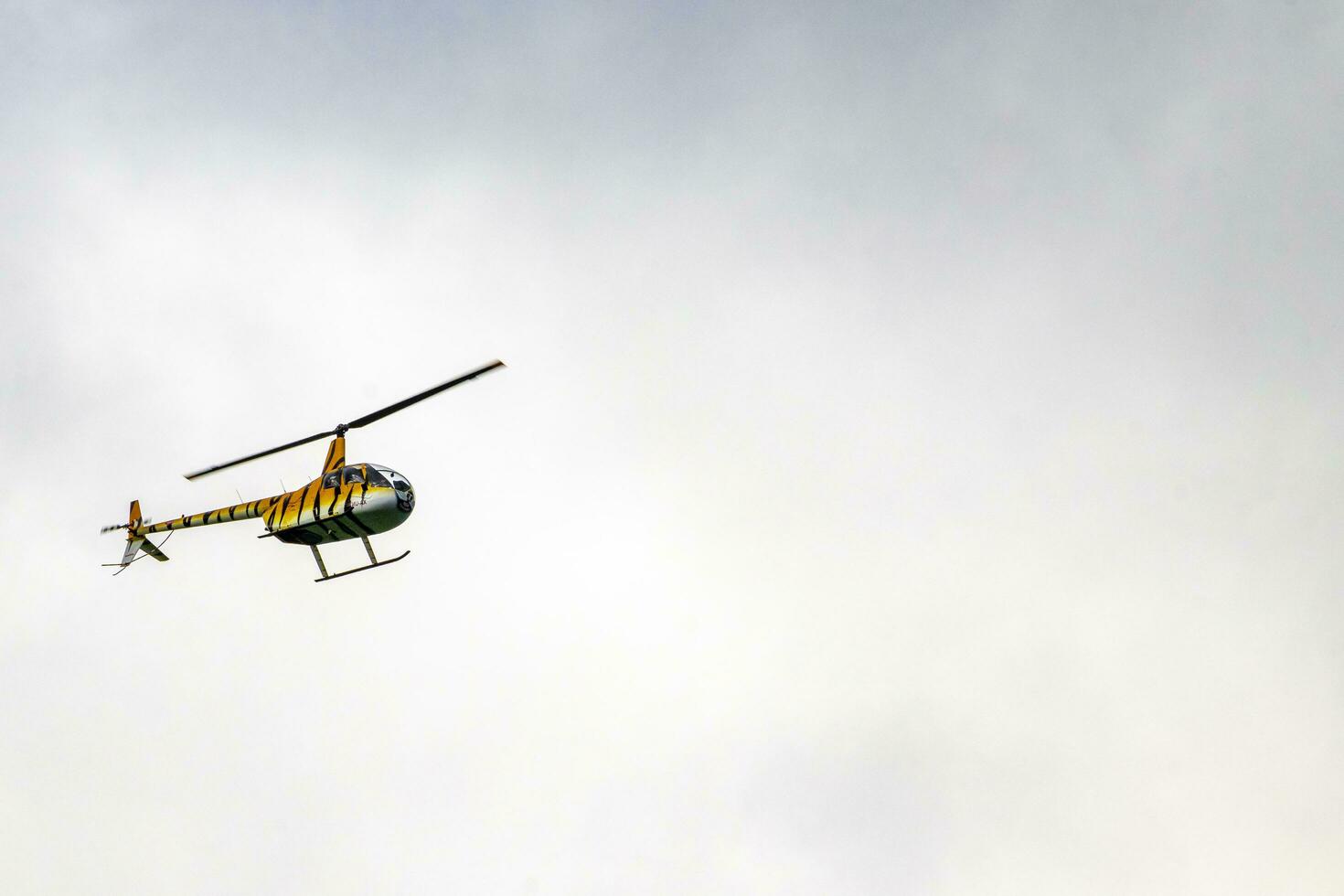 Playa del Carmen Quintana Roo Mexico 2022 Tourist helicopter flies over the Caribbean Sea in Mexico. photo