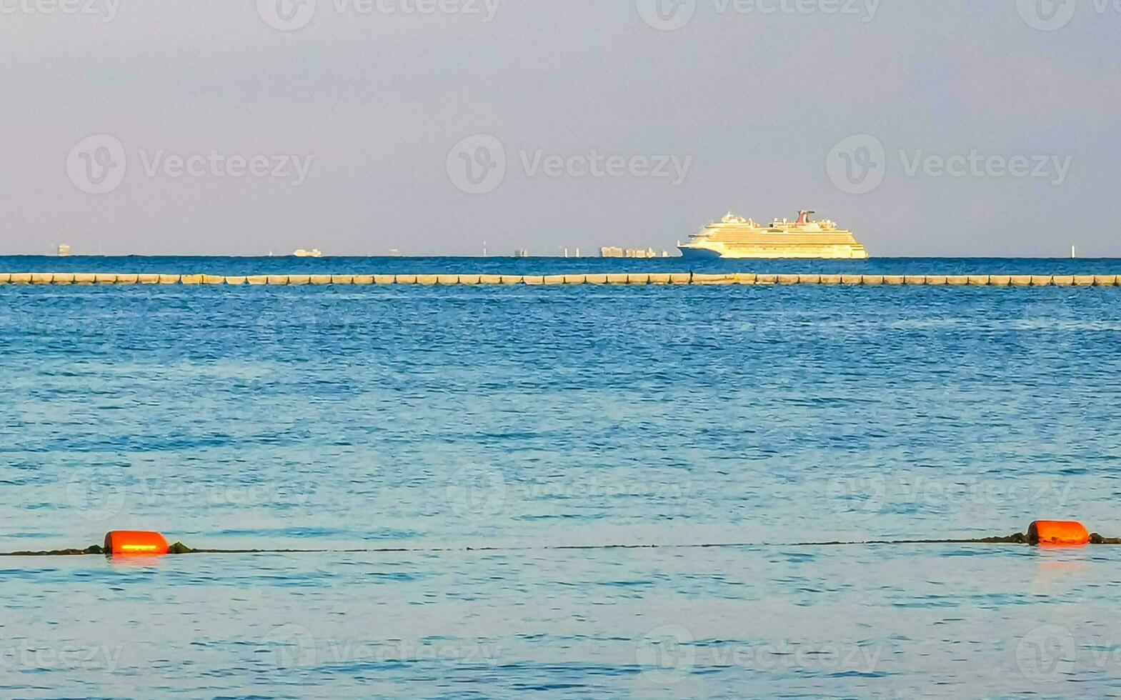 Boats yachts ship catamaran jetty beach Playa del Carmen Mexico. photo