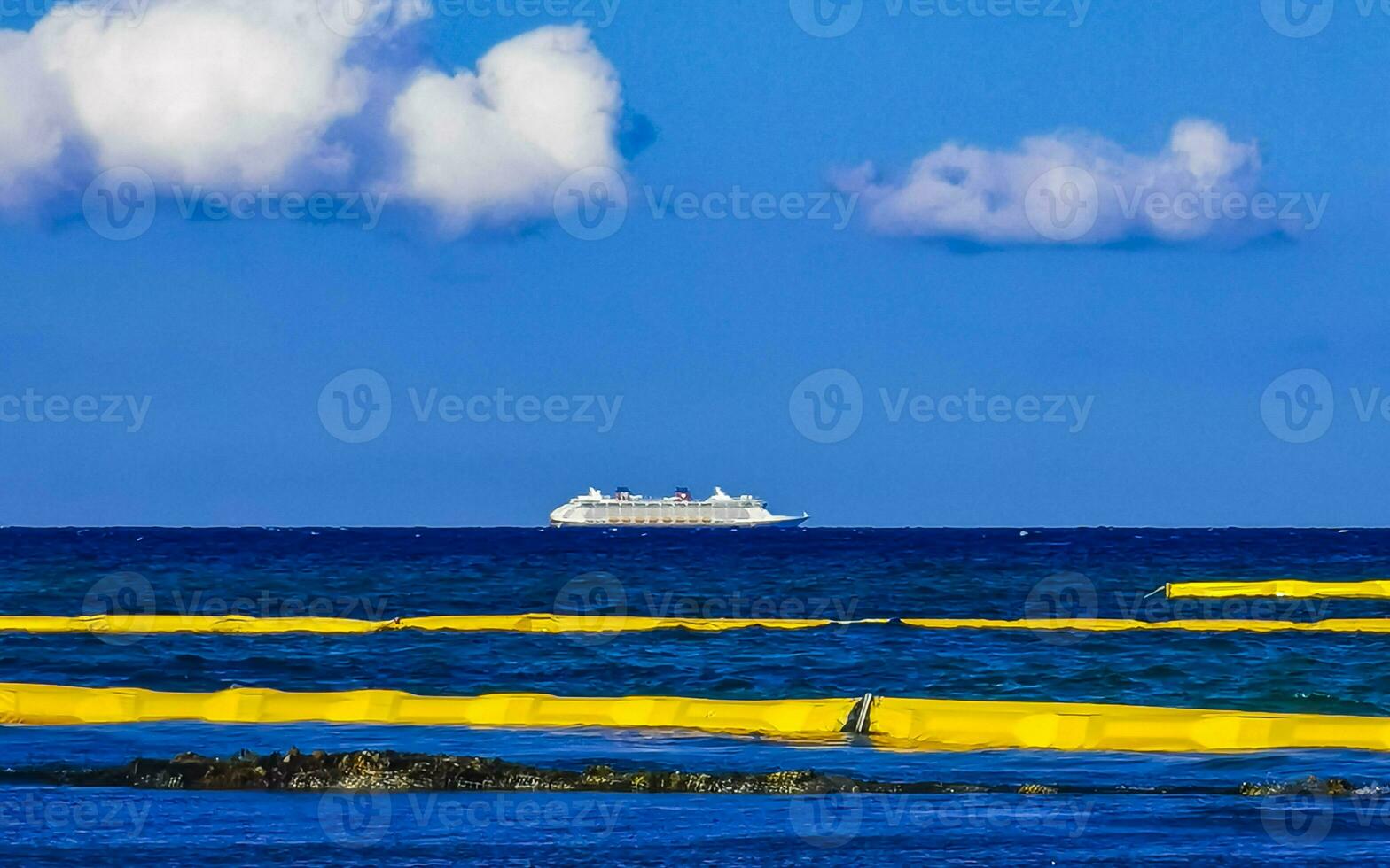 Boats yachts ship catamaran jetty beach Playa del Carmen Mexico. photo