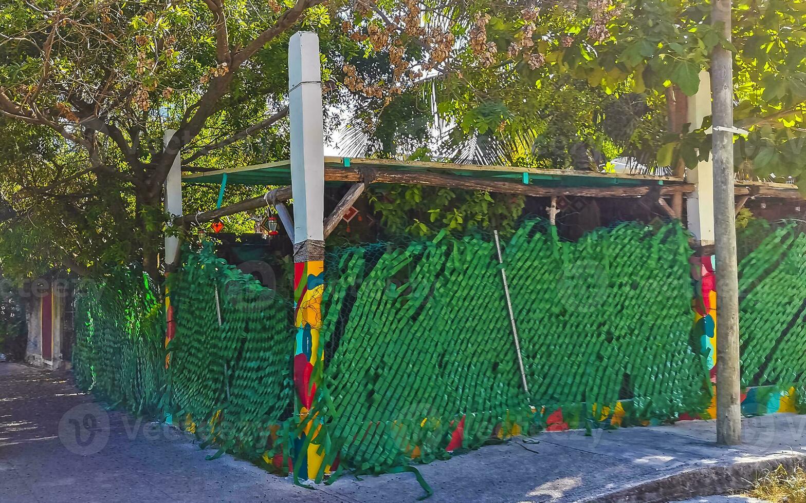 Artistic walls with paintings and graffiti Playa del Carmen Mexico. photo