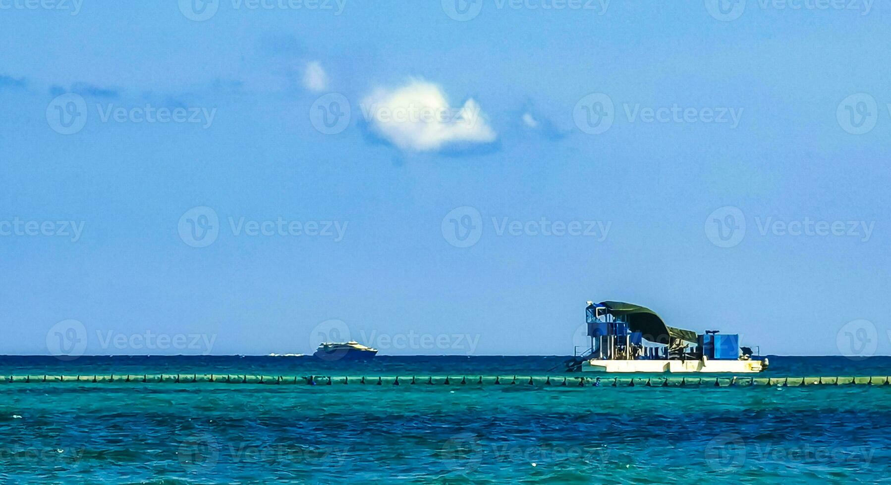 Boats yachts ship catamaran jetty beach Playa del Carmen Mexico. photo