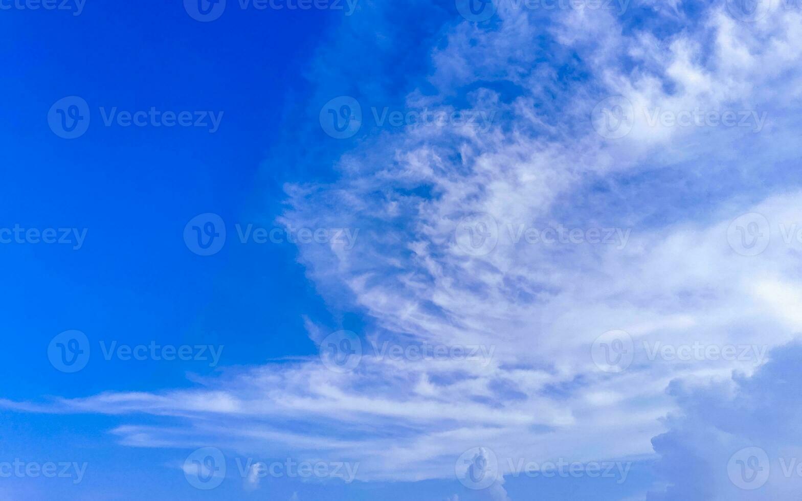 Blue sky with chemical chemtrails cumulus clouds scalar waves sky. photo