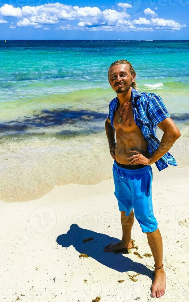 Male tourist Travelling man posing model Playa del Carmen Mexico. photo