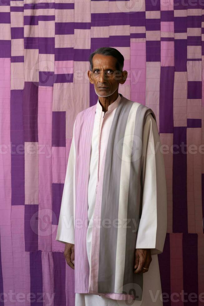 AI generated A Man in a Colorful Long Robe, possibly a Sikh, standing in front of an intricate purple and pink wall. photo