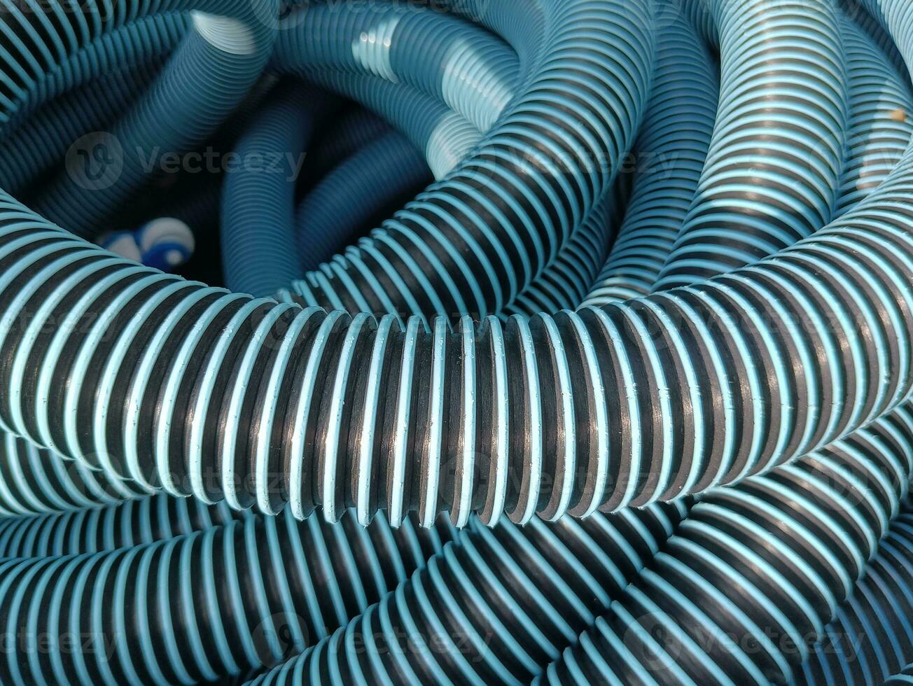 a blue water hose reel photo