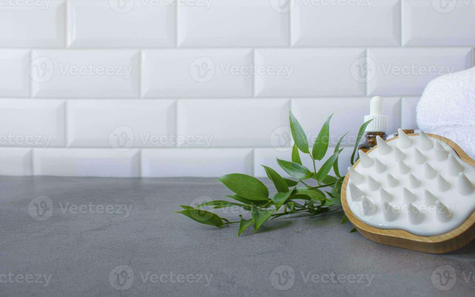 Spa therapy background. Elements of hair care on a gray background. photo