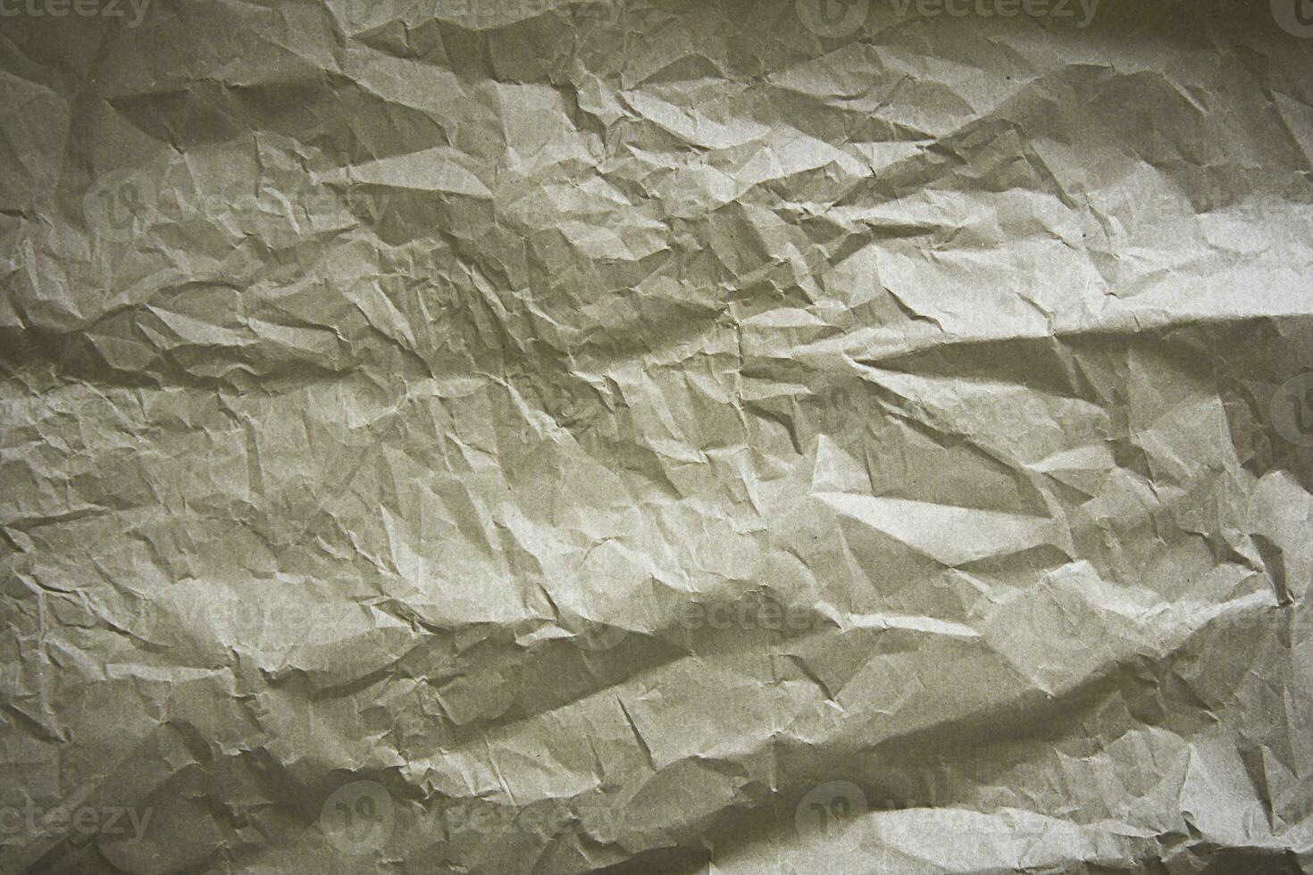 Texture of crumpled paper. Light textured background. photo