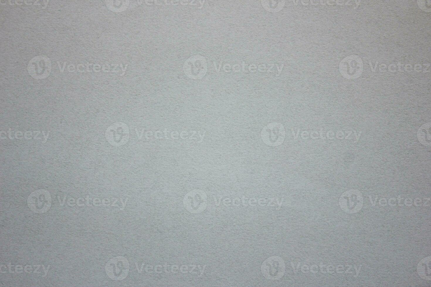 Light gray texture background. Texture of smooth cardboard paper. photo