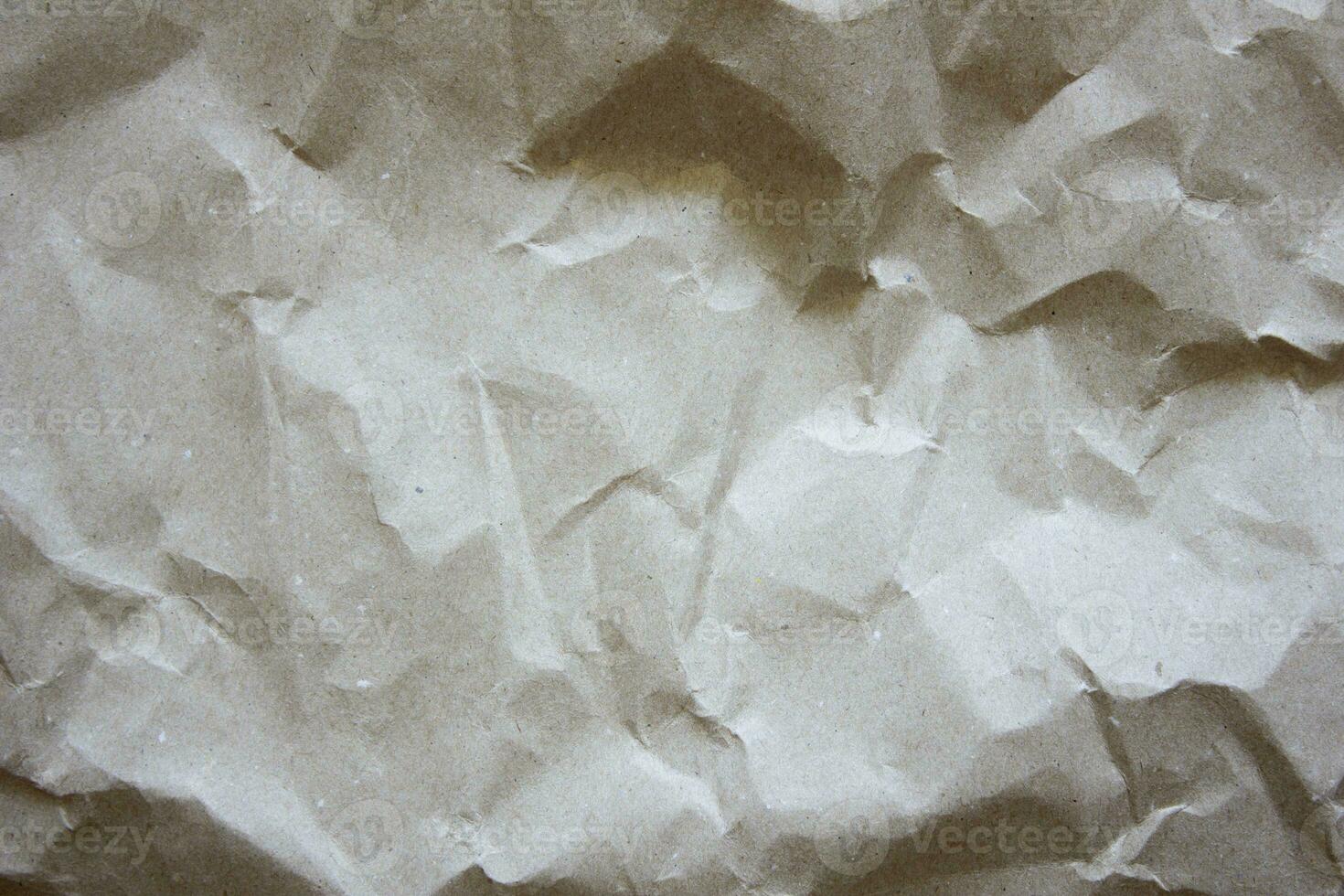 Texture of crumpled paper. Light textured background. photo