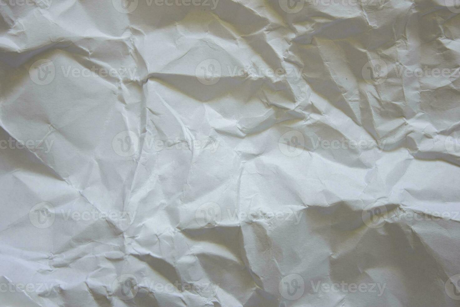 Light textured background. Texture of crumpled paper. photo